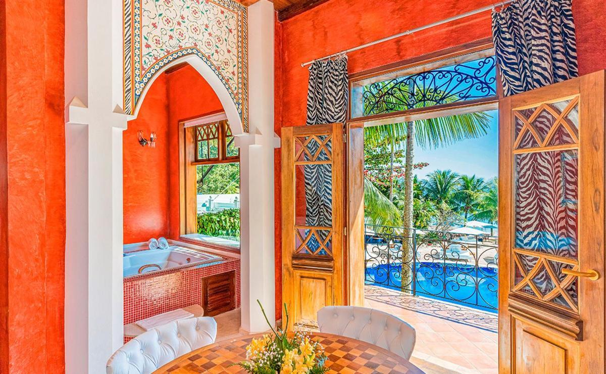 Dpny Beach Hotel & Spa Ilhabela Exterior photo A suite at the W Zanzibar